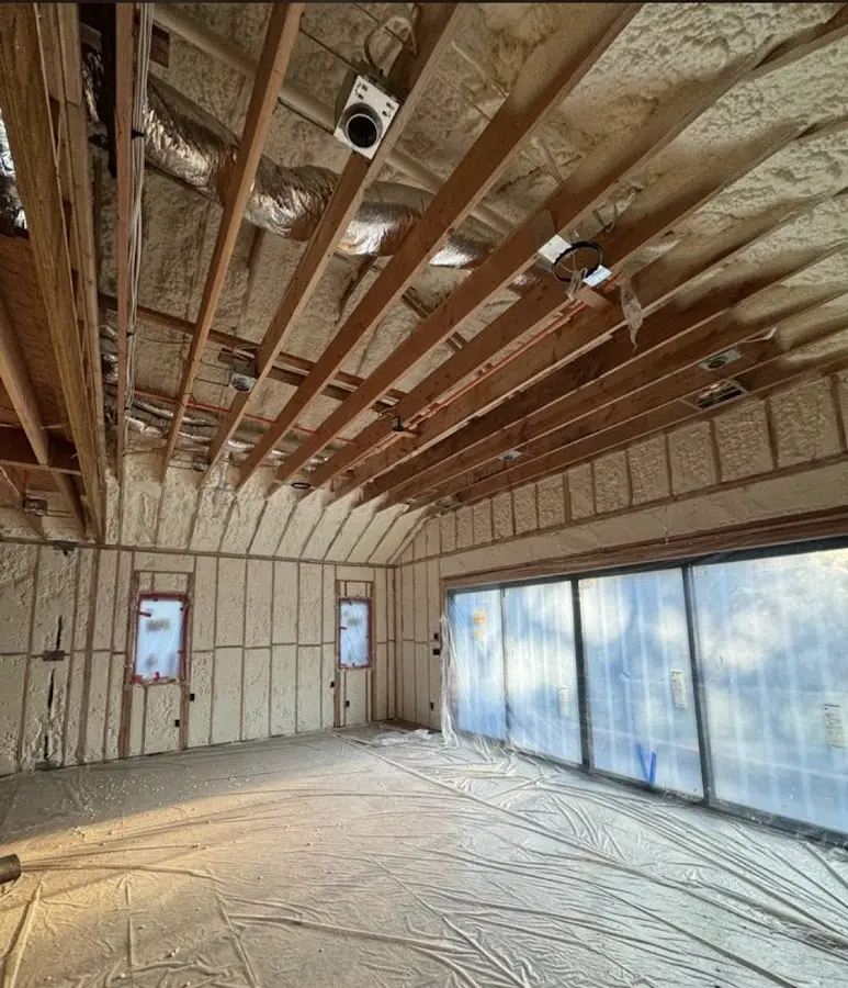 Interior walls and ceiling insulated with spray foam during new construction in Macclenny